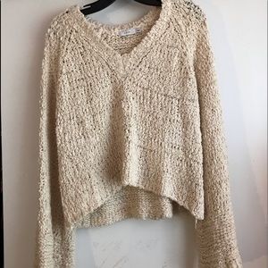 Tan sweater with bell sleeves. Size S.